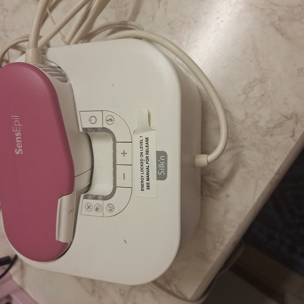 Compact Pink and White Kitchen Appliance